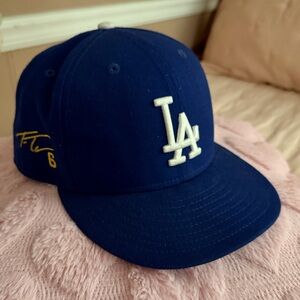 New Era Blue Cap with White and Gold Accents